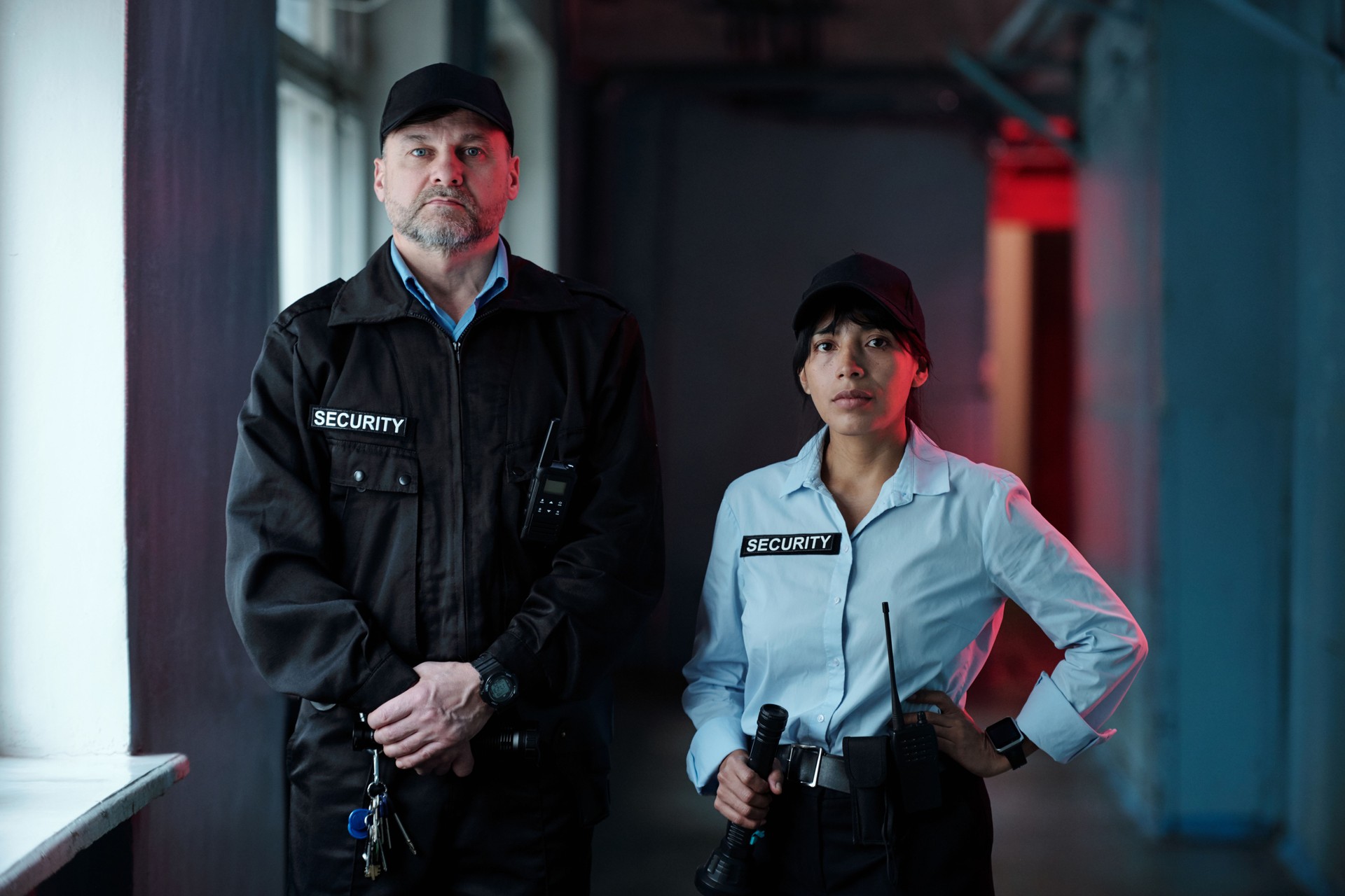 Two guards in corridor of building